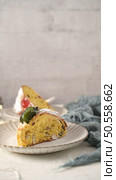 Bolo do Rei or King’s Cake, Made for Christmas, Carnavale or Mardi Gras with Christmas season elements in Background. Стоковое фото, агентство Ingram Publishing / Фотобанк Лори