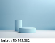 3D Blue Cylinders Podium on White Floor with Spotlight and Blue Wall, Modern Product Display and Mockup for Showroom and Showcase. Стоковая иллюстрация, агентство Ingram Publishing / Фотобанк Лори