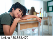 When class becomes dull. The kids started to feel tired and sleepy. Стоковое фото, агентство Ingram Publishing / Фотобанк Лори