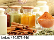 Composition with variety of spices on kitchen table. Стоковое фото, агентство Ingram Publishing / Фотобанк Лори
