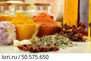 Composition with variety of spices on kitchen table. Стоковое фото, агентство Ingram Publishing / Фотобанк Лори