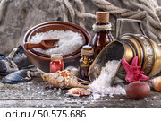 Essential oils and bath salt with a sea shells. Стоковое фото, агентство Ingram Publishing / Фотобанк Лори