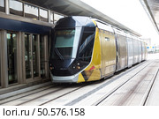 New modern tram in Dubai, United Arab Emirates. Стоковое фото, агентство Ingram Publishing / Фотобанк Лори