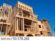 Wooden framing for construction of new condominiums, apartments or townhomes. Стоковое фото, агентство Ingram Publishing / Фотобанк Лори