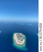 Maldives paradise scenery. Tropical aerial landscape, seascape with long jetty, water villas with amazing sea and lagoon beach, tropical nature. Exotic tourism destination banner, summer vacation. Стоковое фото, агентство Ingram Publishing / Фотобанк Лори