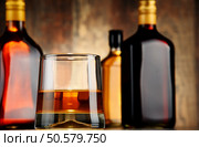 Bottles of assorted alcoholic beverages. Стоковое фото, агентство Ingram Publishing / Фотобанк Лори