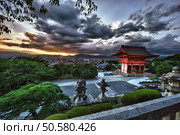 Beautiful dramatic sunset seen from the Kiyomizu-dera shrine above Kyoto, Japan. HDR. Стоковое фото, агентство Ingram Publishing / Фотобанк Лори