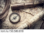vintage still life with compass,sextant spyglass and old map. Стоковое фото, агентство Ingram Publishing / Фотобанк Лори
