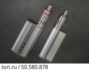 Advanced personal vaporizer or e-cigarette, from above. Стоковое фото, агентство Ingram Publishing / Фотобанк Лори
