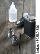 Advanced personal vaporizer or e-cigarette, close up. Стоковое фото, агентство Ingram Publishing / Фотобанк Лори