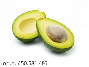 Fresh avocado in halved on white background. Стоковое фото, агентство Ingram Publishing / Фотобанк Лори
