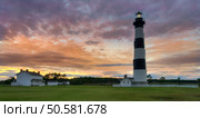 Bodie Island Lighthouse, built in 1872, is just south of Nags Head, a few miles before Oregon Inlet along the Outer Banks of North Carolina. Стоковое фото, агентство Ingram Publishing / Фотобанк Лори