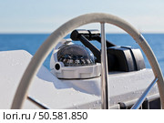 Sailing yacht control wheel and implement. Horizontal close up shot without people. Стоковое фото, агентство Ingram Publishing / Фотобанк Лори