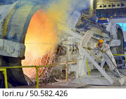 Clean Ladle of molten steel inside of steel plant. Стоковое фото, агентство Ingram Publishing / Фотобанк Лори