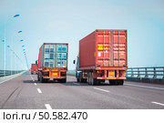 container trucks on the bridge, modern intermodal logistics background. Стоковое фото, агентство Ingram Publishing / Фотобанк Лори