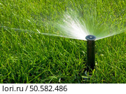 sprinkler of automatic watering. Стоковое фото, агентство Ingram Publishing / Фотобанк Лори