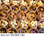 Eastern sweets in a wide range, baklava, Turkish delight. Стоковое фото, агентство Ingram Publishing / Фотобанк Лори
