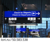 The new airport gate board (blue color) sign showing the aeroplane boarding direction, gate numbers (gateway) for boarding and check-in (check in) time. big colorful display, public information. Modern plane is most universal idea for global earth voyage. Book your ticket in good time - save the money for business tour. Colourful transportation sign symbol, new year (cristmas) holiday ready interior, blue indoor colors, numbers alphabet concept. Стоковое фото, агентство Ingram Publishing / Фотобанк Лори