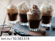 Delicious coffee with crean and cocoa, selective focus. Стоковое фото, агентство Ingram Publishing / Фотобанк Лори