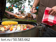 Assorted delicious grilled meat with vegetable over the coals on a barbecue. Assorted delicious grilled meat with vegetable on a barbecue. Стоковое фото, агентство Ingram Publishing / Фотобанк Лори