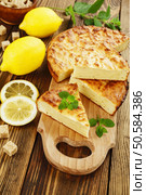Lemon casserole with ricotta on the wooden table. Italian cuisine. Стоковое фото, агентство Ingram Publishing / Фотобанк Лори