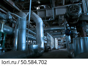   Pipes, tubes, machinery and steam turbine at a power plant. Стоковое фото, агентство Ingram Publishing / Фотобанк Лори