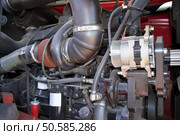 Motor tractors, agricultural motor vehicle parts, part of the diesel engine, the engine of the tractor close-up, the engine of the vehicle.. Motor tractor closeup. Стоковое фото, агентство Ingram Publishing / Фотобанк Лори
