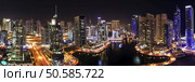 Dubai marina skyscrapers during night hours. Стоковое фото, агентство Ingram Publishing / Фотобанк Лори