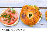 bagel  with a smoked salmon and cream cheese. selective focus. Стоковое фото, агентство Ingram Publishing / Фотобанк Лори