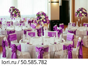 Table set for wedding or another catered event dinner. . Стоковое фото, агентство Ingram Publishing / Фотобанк Лори