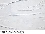 white crumpled and creased glued wrinkled paper poster texture background. Стоковое фото, агентство Ingram Publishing / Фотобанк Лори