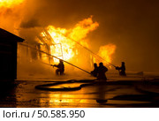 Firemen at work on fire. Стоковое фото, агентство Ingram Publishing / Фотобанк Лори