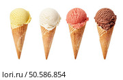 Various ice-cream scoops on white background with assorted balls of vanilla, chocolate, strawberry and butterscotch icecream in waffles.. Various ice-cream scoops on white background. Стоковое фото, агентство Ingram Publishing / Фотобанк Лори