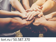 Business teamwork join hands together. Business teamwork concept. Стоковое фото, агентство Ingram Publishing / Фотобанк Лори