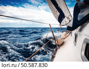 The white sails of yachts on the background of sea and sky in the clouds. Стоковое фото, агентство Ingram Publishing / Фотобанк Лори