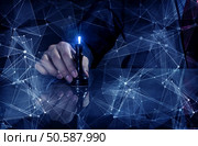 Hand of businessman on dark background making chess move  . Business leadership strategy. Стоковое фото, агентство Ingram Publishing / Фотобанк Лори