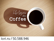 Life begins after coffee: Quote with coffee cup on wood background. Стоковое фото, агентство Ingram Publishing / Фотобанк Лори