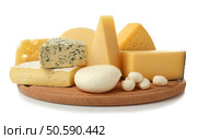 Assortment of cheese on wooden board isolated on white. Стоковое фото, агентство Ingram Publishing / Фотобанк Лори