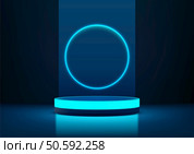futuristic scene a glowing blue circle on a dark background, centered on a round platform with matching blue light. minimalist and modern technology concept, product display or tech showcase. Стоковая иллюстрация, агентство Ingram Publishing / Фотобанк Лори