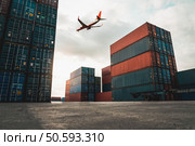 Freight airplane flying above overseas shipping container . Logistics supply chain management and international goods export concept .. Freight airplane flying above overseas shipping container. Стоковое фото, агентство Ingram Publishing / Фотобанк Лори