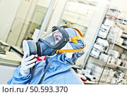 Calm In The Face of Danger - Female Hazmat / Hachem Scientist @ Work. Стоковое фото, агентство Ingram Publishing / Фотобанк Лори