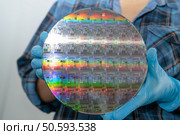 Silicon wafer for manufacturing semiconductor of integrated circuit. Стоковое фото, агентство Ingram Publishing / Фотобанк Лори
