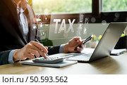 Tax deduction planning involves strategically identifying and utilizing eligible deductions to reduce taxable income and lower overall tax liability. mortgage interest, business expenses. Стоковое фото, агентство Ingram Publishing / Фотобанк Лори
