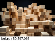 Wooden cubes creating an abstract pixelated landscape on black background. Стоковое AI-изображение, AI-художник Иван Рябоконь / Фотобанк Лори