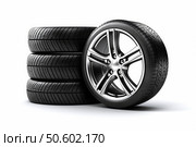 Car tires showing a stack of three tires and an alloy wheel rim. Стоковое AI-изображение, AI-художник Иван Рябоконь / Фотобанк Лори