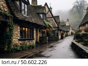Charming stone cottages line a serene road in cotswolds village on a foggy day. Стоковое AI-изображение, AI-художник Иван Рябоконь / Фотобанк Лори