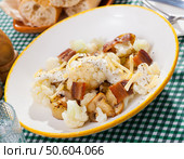 Cauliflower with potatoes and brisket meat served with cheese sauce. Стоковое фото, фотограф Яков Филимонов / Фотобанк Лори