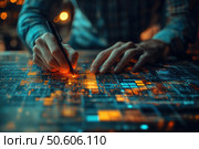 A futuristic scene with a close-up of a person's hands working with an interactive digital interface. A stylus is used, with which the user interacts with a high-tech panel displaying abstract diagrams, data and glowing elements in shades of orange and blue. The image conveys an atmosphere of technology, innovation and creative development. Ideal for IT, programming, data analysis, interface design and digital future topics. Стоковое AI-изображение, AI-художник Анна Кривицкая / Фотобанк Лори