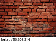 Old red brick wall showing deterioration and crumbling mortar. Стоковое AI-изображение, AI-художник Иван Рябоконь / Фотобанк Лори