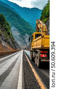 A yellow dump truck is driving down a mountain road. Стоковое AI-изображение, AI-художник Ярославский Максим / Фотобанк Лори